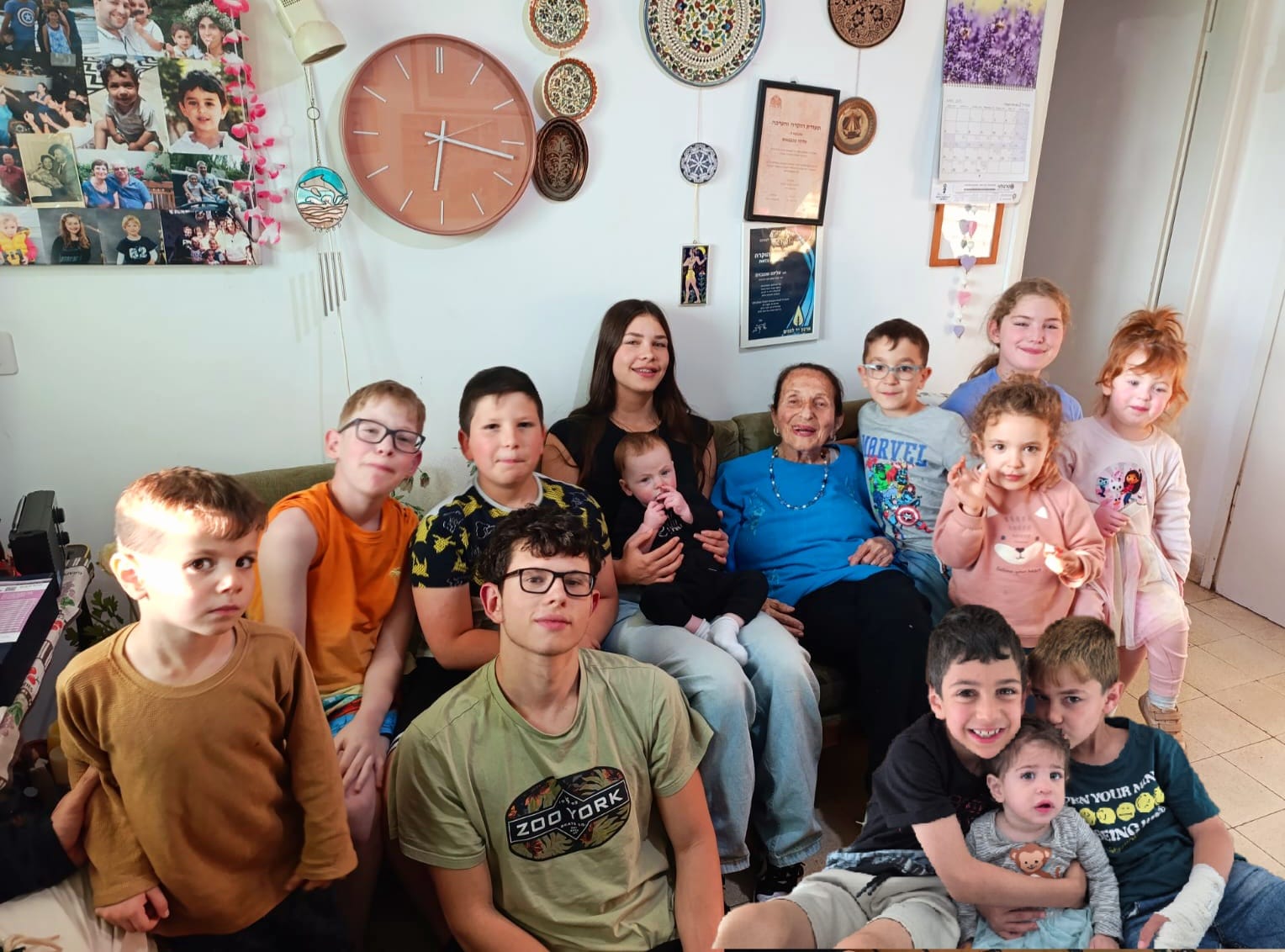 Alisa with her great-grandchildren, April 2025